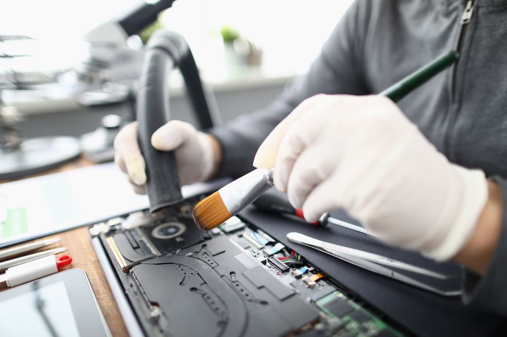 Working inside an opened laptop