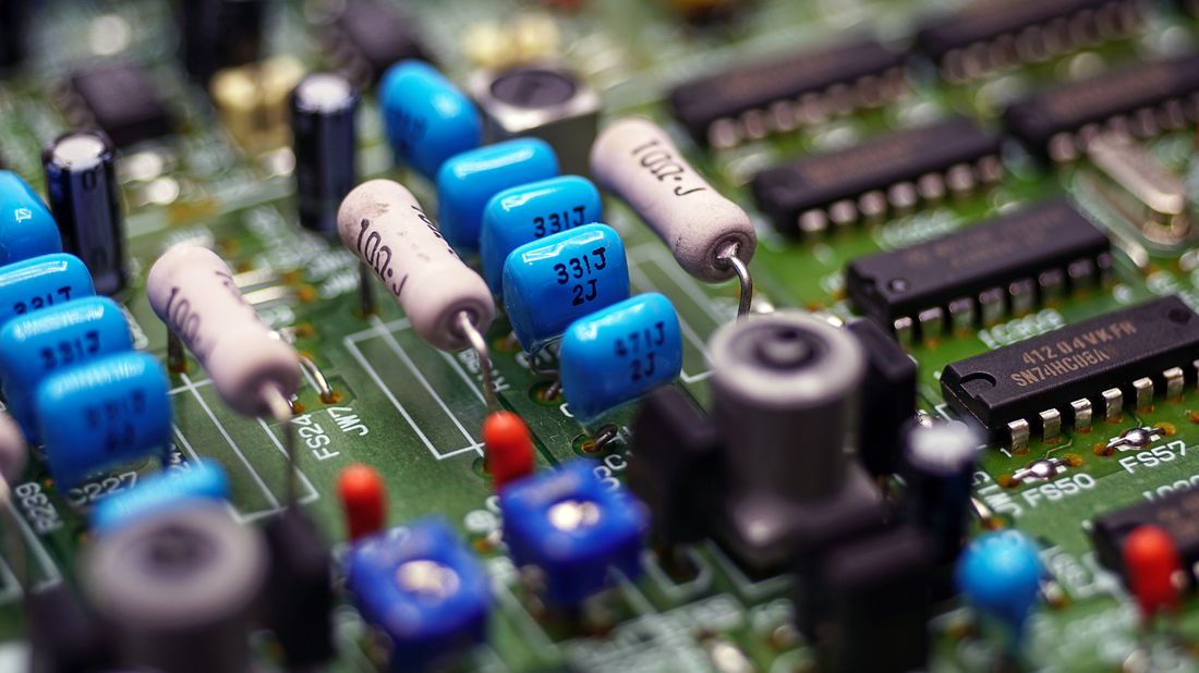 Close-up of a circuit board and its capacitors